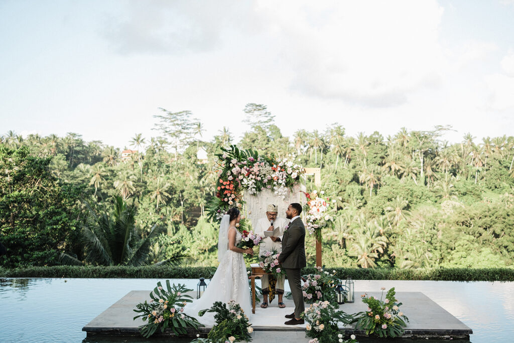 bali elopement wedding ubud jungle ceremony intimate couple floral arch documentary photography