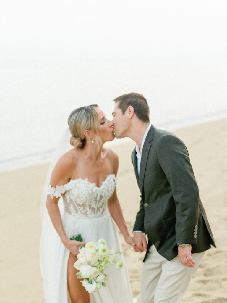 bali beach elopement couple kissing romantic wedding photography