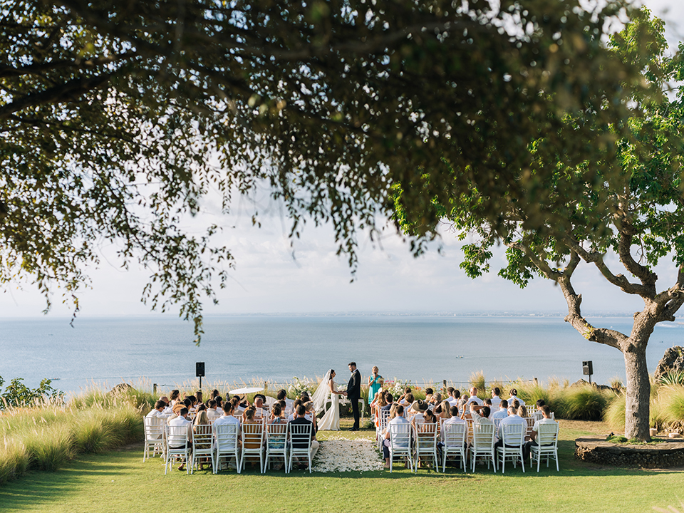 emotional wedding ceremony at Puri Bhagawan Bali garden with ocean view