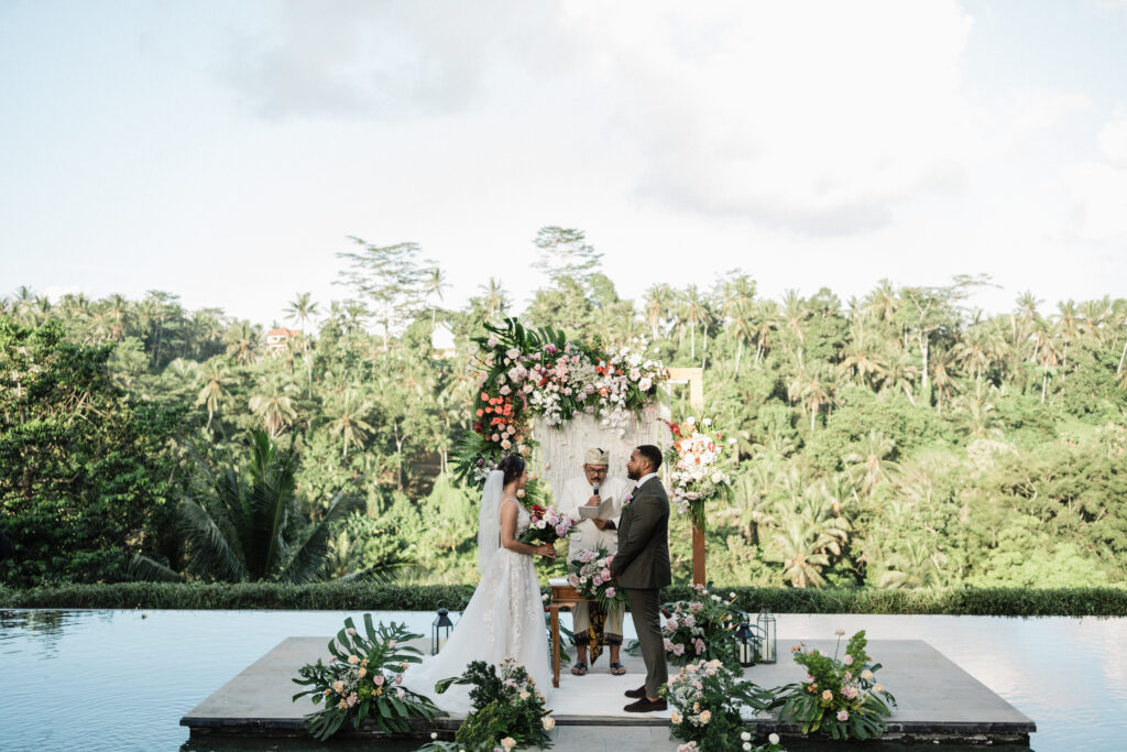 bali elopement wedding ubud jungle intimate ceremony couple floral altar