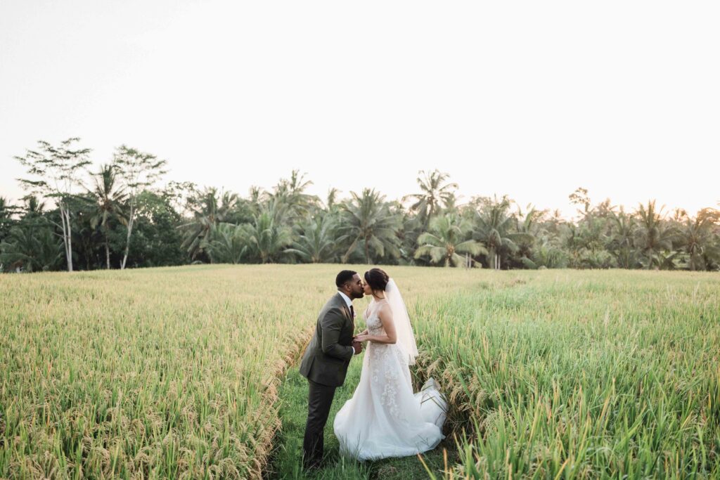 ubud rice field couple portrait golden hour palm trees