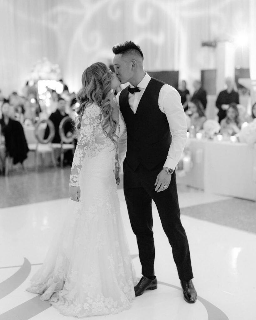 Caroline and Adam first dance at Science World wedding reception Vancouver, black and white