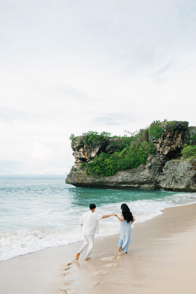 Sunset couple session Uluwatu Bali vintage car beach cliff backdrop