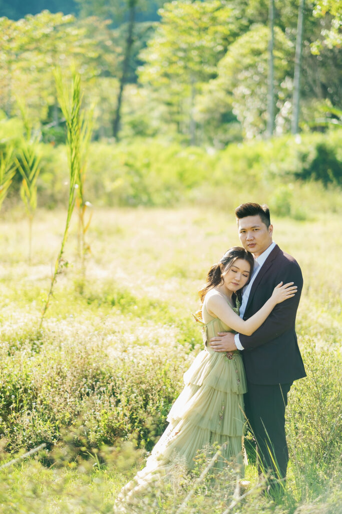 Pre-wedding photoshoot Bali meadow lush green natural embrace