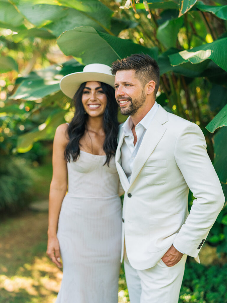 Bride and groom portrait in tropical garden at Wonderland Uluwatu during intimate Bali wedding
