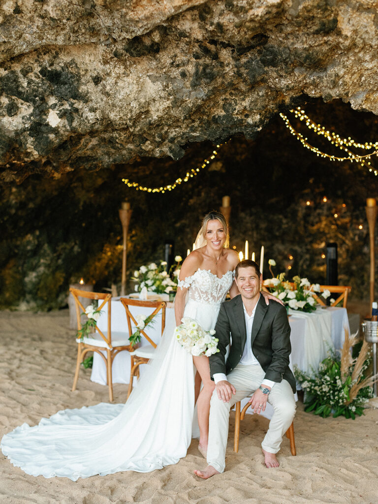 samabe bali elopement with family cave dinner romantic wedding setup beach cave bali