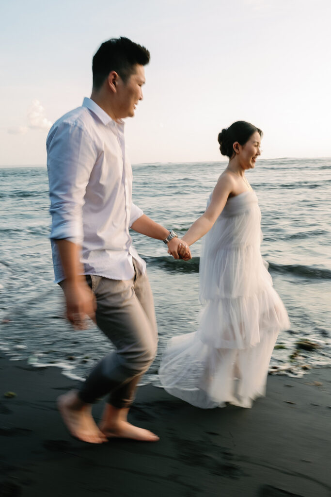 Candid couple photoshoot Bali beach natural movement