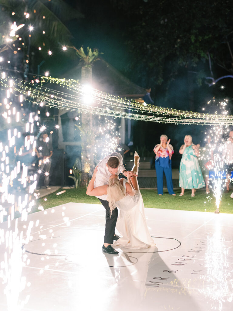 intimate villa wedding in Bali first dance with sparkler lights and romantic moment