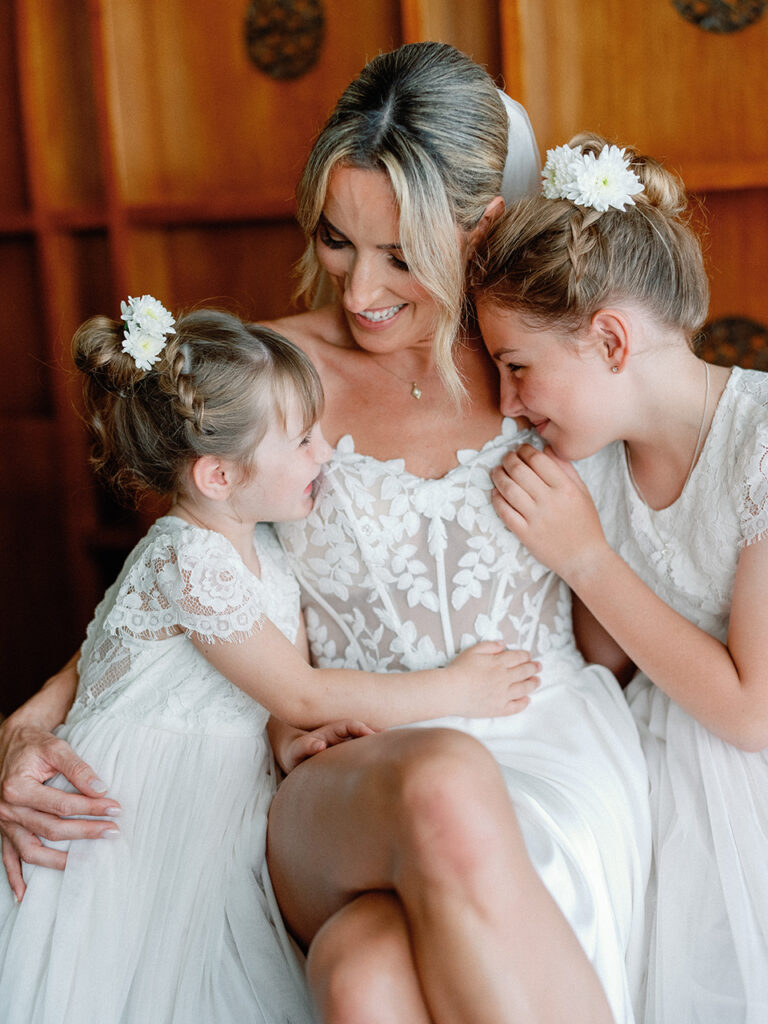 samabe bali elopement with family intimate moment bride with children emotional candid