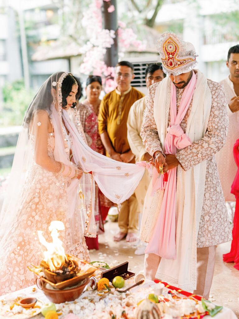 indian wedding bali ceremony at conrad bali sacred fire ritual candid moment