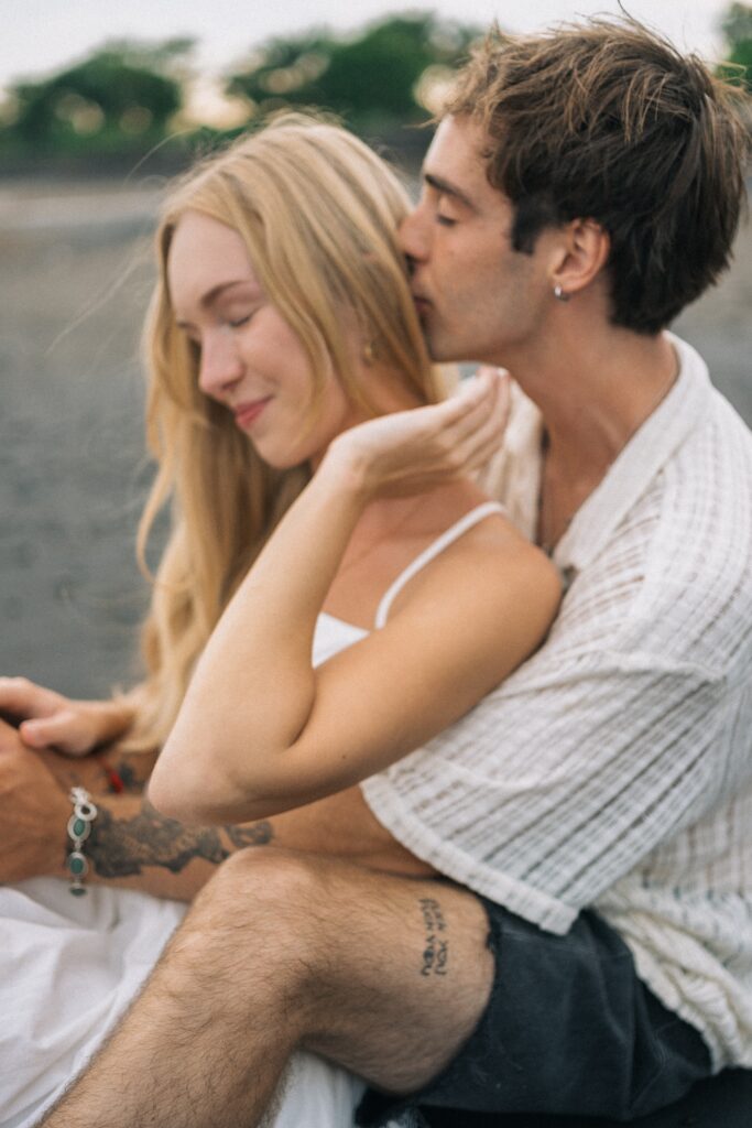 bali couple photoshoot intimate moment with natural candid embrace and soft light