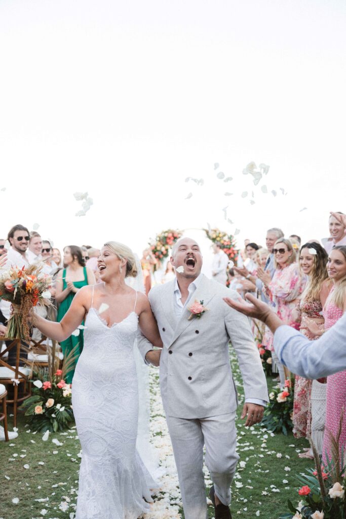 best time to get married in bali august peak season ceremony exit celebration guests documentary wedding