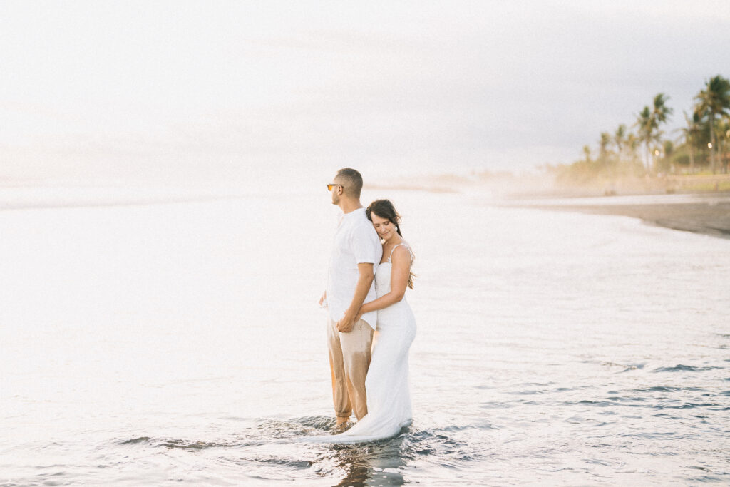 intimate couple session bali sofian ilsey quiet back embrace at pasut beach ocean