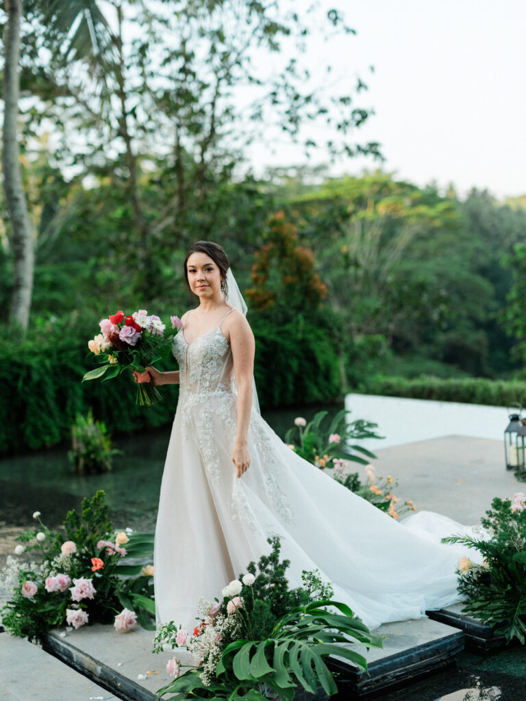 Bride portrait during Ubud elopement at Jannata Resort Bali with bouquet and jungle backdrop