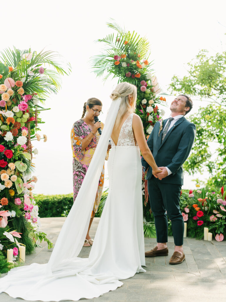 bali wedding photography cost luxury ceremony floral arch tropical destination wedding bali