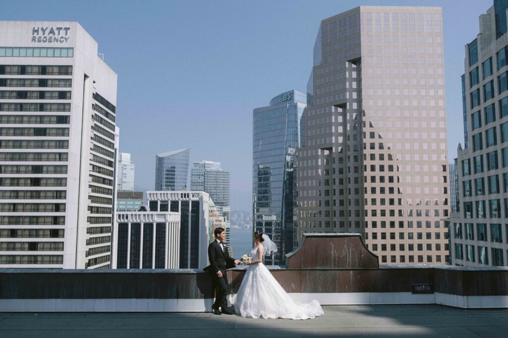 Rooftop wedding portraits Vancouver city skyline — Luxima Wedding Photography
