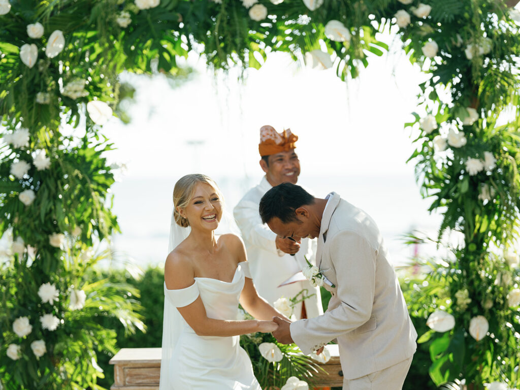 Wedding ceremony ring exchange at Padma Resort Legian Bali — Luxima wedding photographer