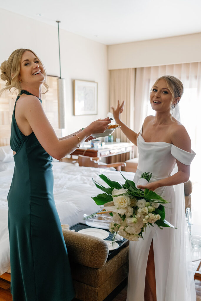 Bride with bridesmaid getting ready at Padma Resort Legian Bali wedding
