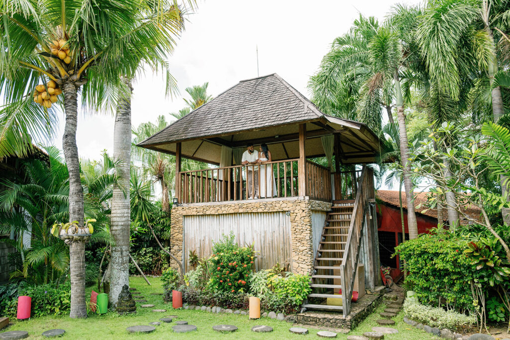 Tropical wooden balcony at Villa Desa Roro used for an intimate engagement celebration in Bali