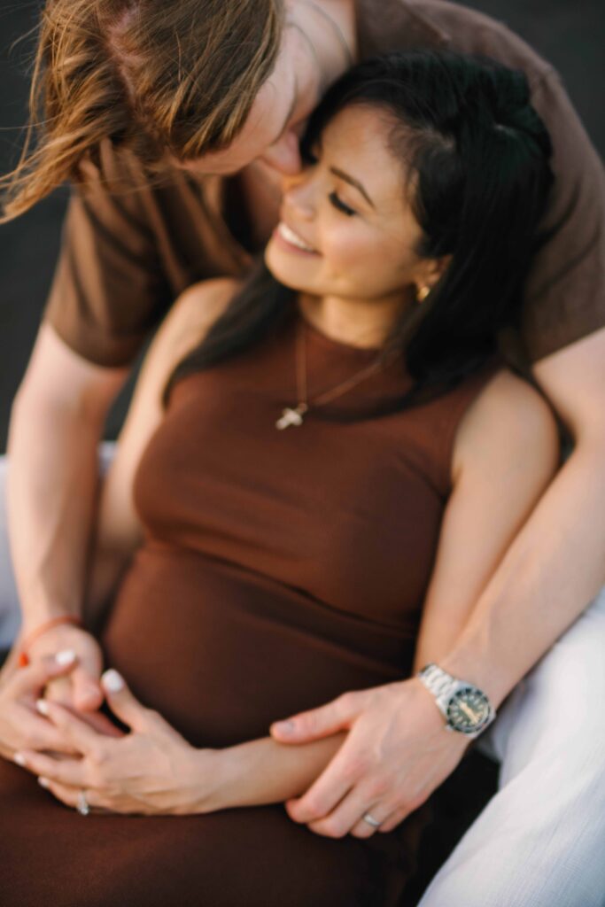 Elly and Tom intimate moment maternity session Nyanyi Beach Bali