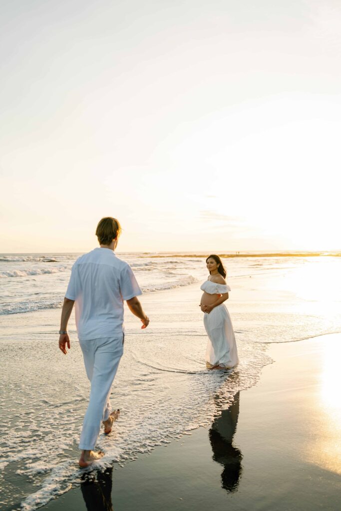 Elly maternity photoshoot Nyanyi Beach Bali sunset tide coming in